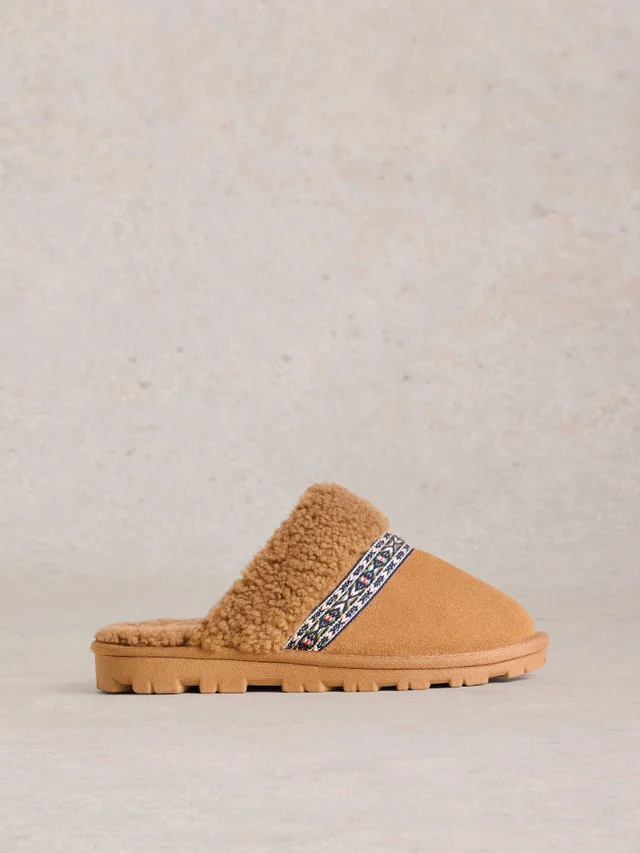 Mules en daim et peau de mouton