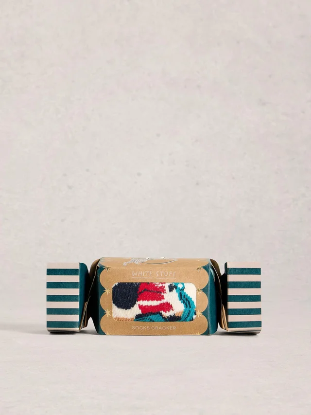 Le Père Noël au volant dans un cracker